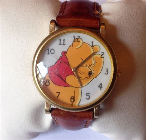 Buying the perfect timepiece is like purchasing art. . Winnie the pooh timex watch